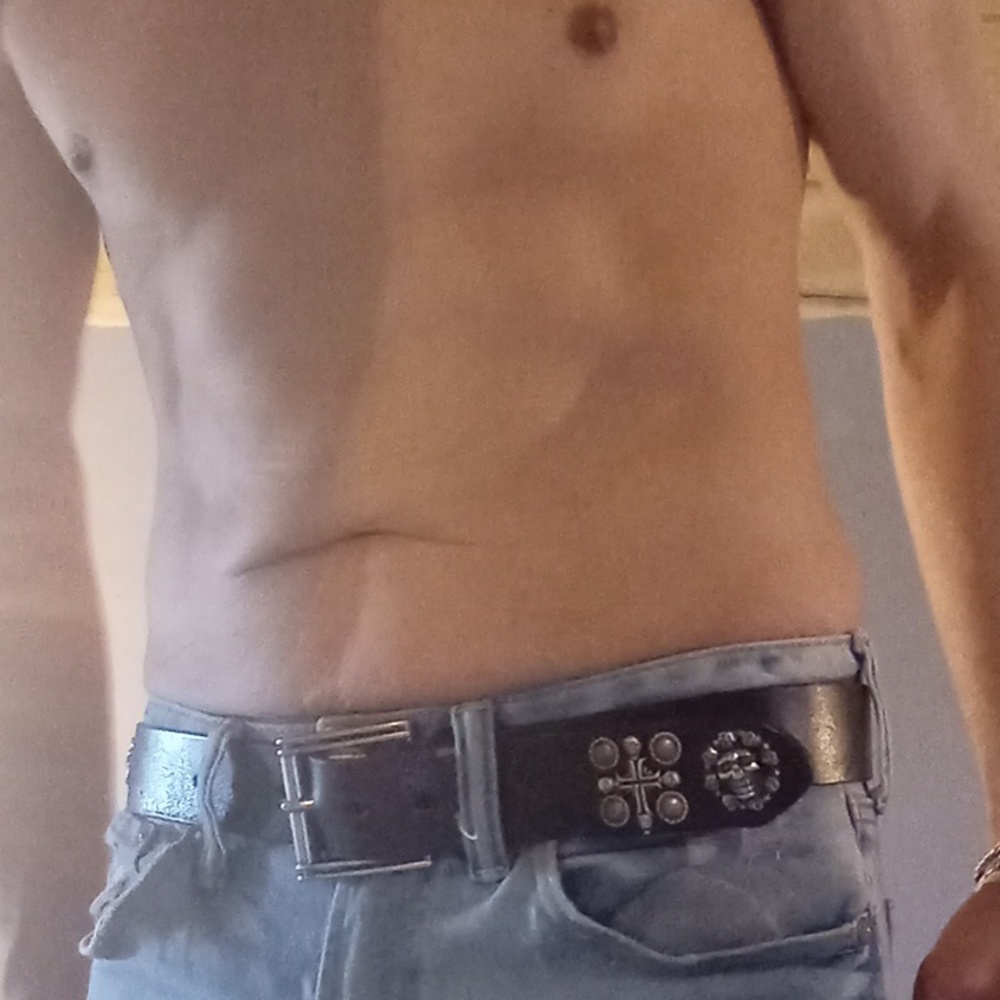 Custom cowhide leather belt with metal decor with are riveted through leather